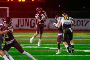Mercer Island junior Carter Burr (pictured) catches a pass in the flat from quaterback Clay Dippold in the first quarter of play against Bellevue. Bellevue defeated Mercer Island, 47-0, on Oct. 26. Photo courtesy of Don Borin/Stop Action Photography