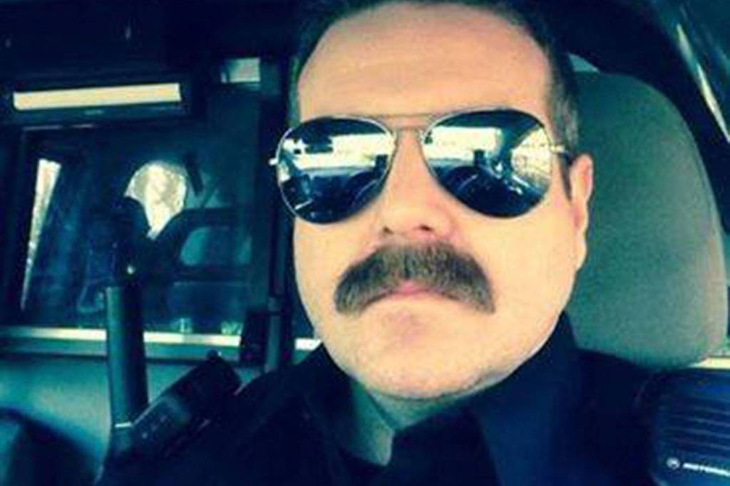 Officer Todd Roggenkamp shows off his stache in support of the Movember awareness campaign. Photo courtesy of Todd Roggenkamp