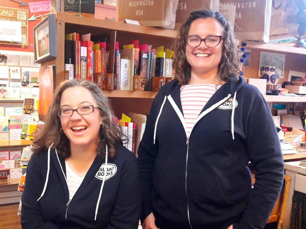 Island Books staffers Lillian and Lori wear their Island Books hoodies at the stores 45th anniversary party on Nov. 3. Photo courtesy of Nancy Shawn