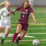 Mercer Island senior midfielder Jackie Stenberg, right, tries to keep the ball away from Bonney Lake midfielder Summer Kober, left, in the first round of the Class 3A state playoffs on Nov. 6 at Mercer Island High School. Photo courtesy of Patrick Krohn/Patrick Krohn Photography