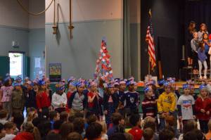 Island Park kindergarteners sing Youre a Grand Old Flag at the schools Veterans Day assembly on Nov. 8. Photo courtesy of Craig Degginger