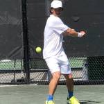 Mercer Island Islanders boys tennis head coach Ryan Pang (pictured) practices before a doubles match at the International Tennis Federation Seniors World Team Championships in Miami. Photo courtesy of Ryan Pang