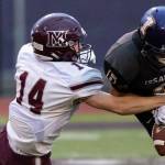 Mercer Island football player Hunter Johnson, left, makes a play against the Issaquah Eagles during a non-league game this past September. Johnson was one of three Islanders football players that captured 2A/3A KingCo first-team, all-league honors. Photo courtesy of Patrick Krohn/Patrick Krohn Photography