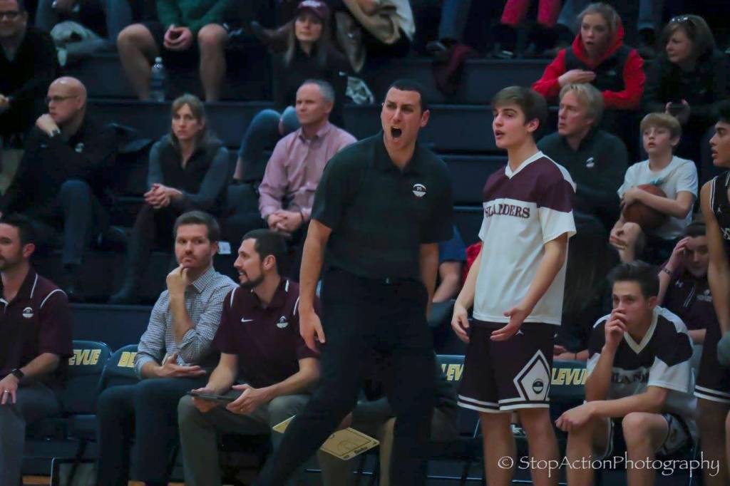 Mercer Island Islanders boys basketball head coach Gavin Cree (pictured) coaches with intensity in a matchup against the Bellevue Wolverines during the 2017-2018 season. The 2018-19 season will be Crees 10th season leading the Islanders boys basketball program. Photo courtesy of Don Borin/Stop Action Photography