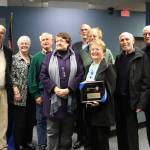 Judy Clibborn holds her key to the city while smiling with colleagues who served with her on the Mercer Island City Council, including Linda Jackman, Susan Blake, Dan Grausz, Elliot Newman and Fred Jarrett. Katie Metzger/staff photo