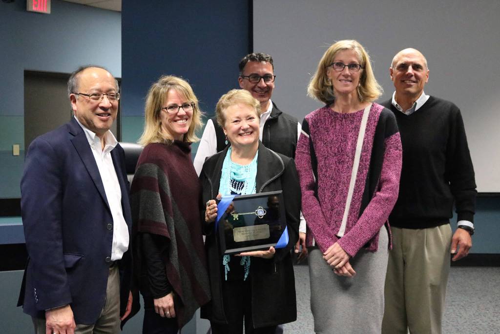Retiring Rep. Judy Clibborn (D-Mercer Island) smiles with current members of the city council - Benson Wong, Wendy Weiker, Salim Nice, Debbie Bertlin and Bruce Bassett - at a reception held for her on Nov. 26. Katie Metzger/staff photo