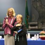 Retiring Rep. Judy Clibborn receives the first key to the city from Mercer Island Mayor Debbie Bertlin. Katie Metzger/staff photo