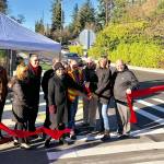 Mercer Island City Councilmember Wendy Weiker, Mercer Island School District Superintendent Donna Colosky, School Board members Brian Giannini Upton and Tracy Drinkwater, Mayor Debbie Bertlin and others help cut the ribbon for a new Safe Route to School project near Northwood Elementary. Photo via Facebook
