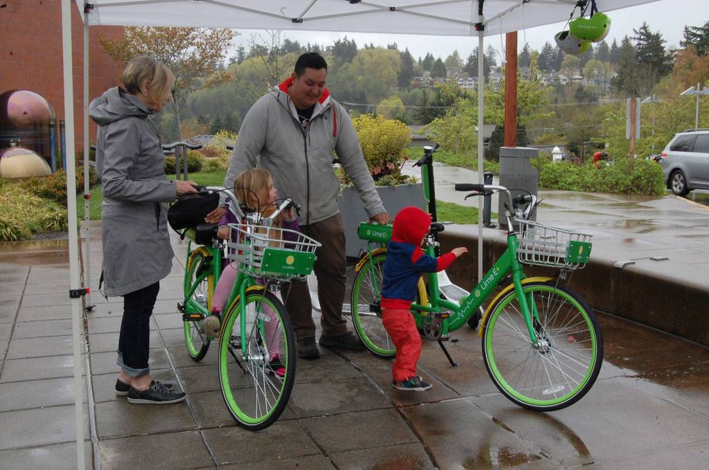 LimeBike offered electric bike demos at the Leap for Green fair in April 2018. Later, the city would conduct pilot project with ride share and E-bike companies, testing out first/last mile solutions for Mercer Island commuters. Katie Metzger/staff photo