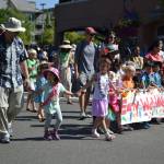 Early World Montessori students walked in the Summer Celebration parade in July 2018. The theme of this years event was Island Vibes. Katie Metzger/staff photo