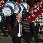 MIHS marching band teacher, Parker Bixby, cheers as the band marches in the Tournament of Roses parade. Photo courtesy of Unofficial_MIHSBand Instagram page.
