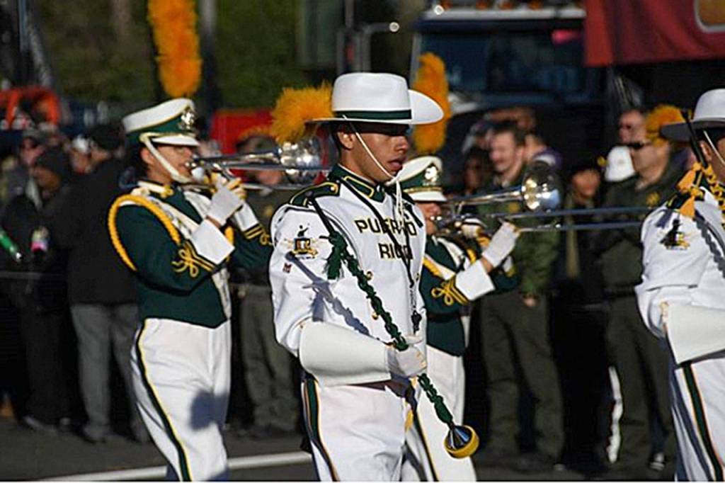 Jonuel N. Lopez Martinez, a member of the Banda Escolar de Guayanilla (BEG) marching band of Puerto Rico, marches alongside the MIHS marching band in the Tournament of Roses. Photo courtesy of Unofficial_MIHSBand Instagram page.