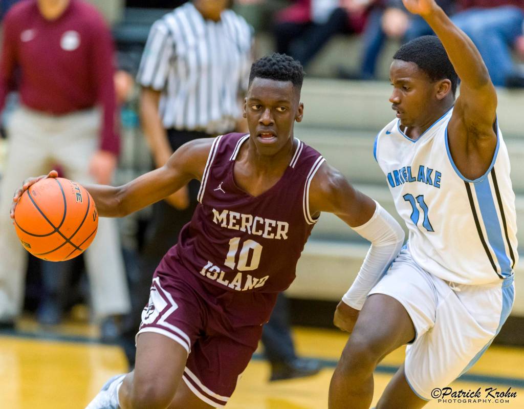 Mercer Island Islanders guard Nigel Seda, left, scored a team-high 15 points against the Interlake Saints on Jan. 22. Mercer Island defeated Interlake 63-46. Photo courtesy of Patrick Krohn/Patrick Krohn Photography