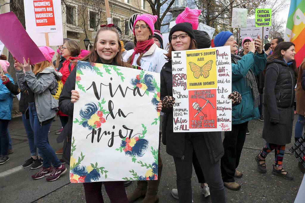 Seattle Pacific University students Delaney Palmer and Bridgett Palmer attended the Womxns March on Jan. 19 for the second time. They said its important to fight back. Stephanie Quiroz/staff photo