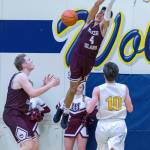 The Mercer Island Islanders boys basketball team registered a 57-41 win on the road against the Bellevue Wolverines on Feb. 1 in Bellevue. Adam Parker (pictured with the dunk) scored a team-high 22 points against the Wolverines. The Islanders clinched the 2A/3A KingCo regular season title with the victory. Mercer Island, who currently has an overall record of 16-4, have won eight consecutive games. Photo courtesy of Patrick Krohn/Patrick Krohn Photography