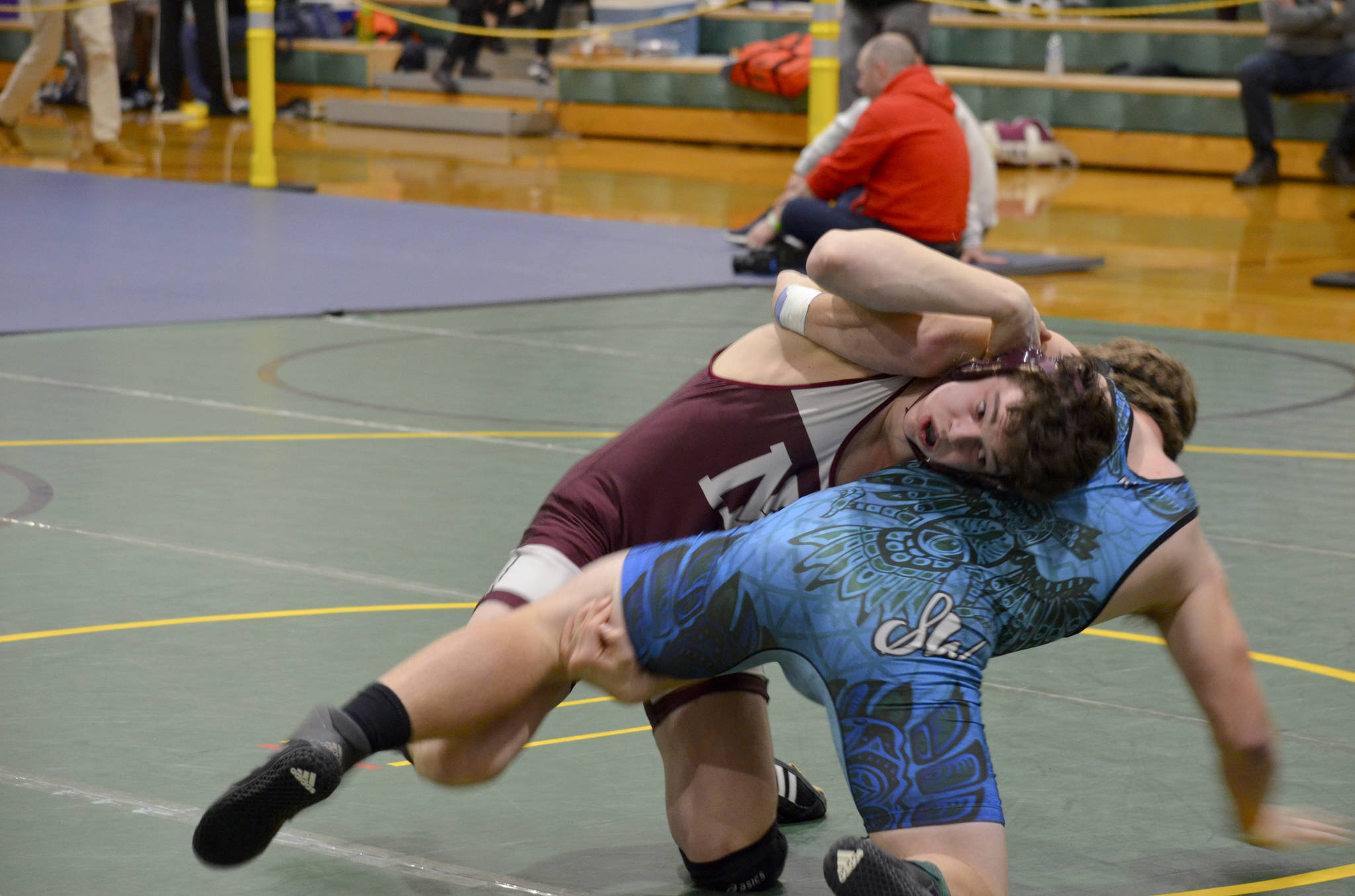 Mercer Island Islanders wrestler Colin Farrell, left, registered a first place finish in the 182-pound weight division at the KingCo/Wesco 3A sub-regionals on Feb. 2. Photo courtesy of Billy Pruchno