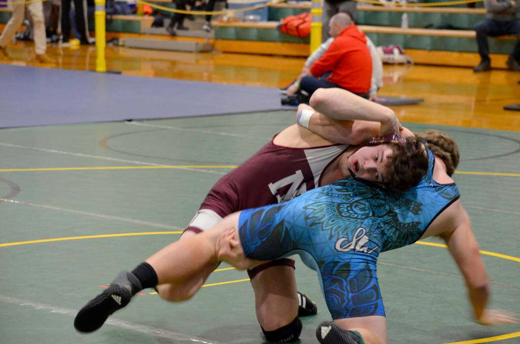 Mercer Island Islanders wrestler Colin Farrell, left, registered a first place finish in the 182-pound weight division at the KingCo/Wesco 3A sub-regionals on Feb. 2. Photo courtesy of Billy Pruchno