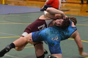 Mercer Island Islanders wrestler Colin Farrell, left, registered a first place finish in the 182-pound weight division at the KingCo/Wesco 3A sub-regionals on Feb. 2. Photo courtesy of Billy Pruchno