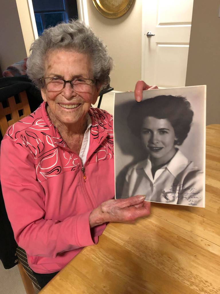 Meredythe Glass poses with one of her headshots from when she worked in Hollywood in the late 1930s. Photo courtesy of Greg Asimakoupoulos