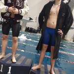 Jake Headrick, left, and Alex Edwards on the 500 free victory podium. Andy Nystrom / staff photo