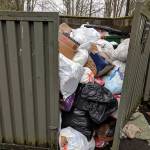 The trash situation at a Redmond apartment complex remained overflowing in the afternoon on Tuesday, Feb. 19, after a series of snowstorms hit the region in February. Corey Morris/staff photo