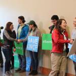 Sen. Maria Cantwell and Rep. Suzan DelBene shake hands with outdoor enthusiasts and conservationists before a rally to save the Land and Water Conservation Fund in Seattle on Feb. 21. Katie Metzger/staff photo
