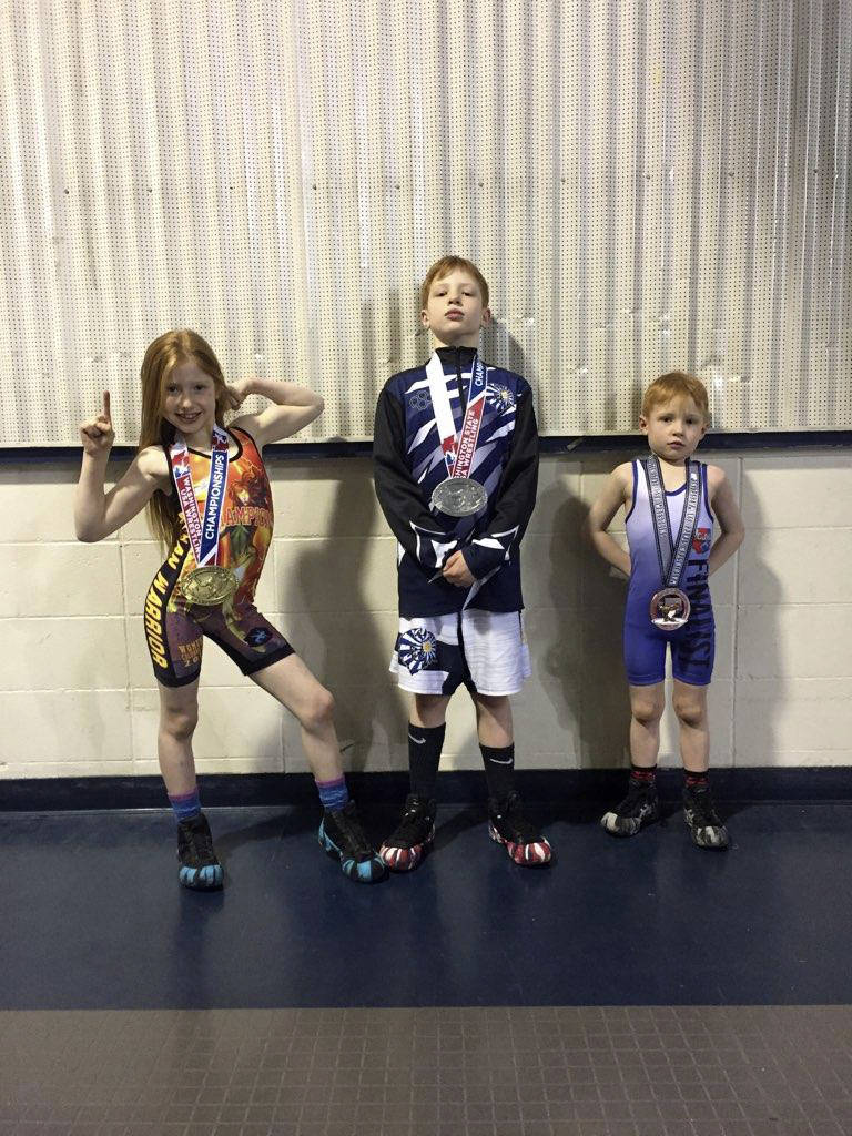 Elementary school wrestlers Arabella Chapman, Alex Chapman and Briak Chapman competed at the 2019 WSWA Folkstyle state tournament on Feb. 17 at the Tacoma Dome. Photo courtesy of Connie Chapman