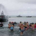A King County Sheriffs Office boat sprays water at polar plunge participants. Katie Metzger/staff photo