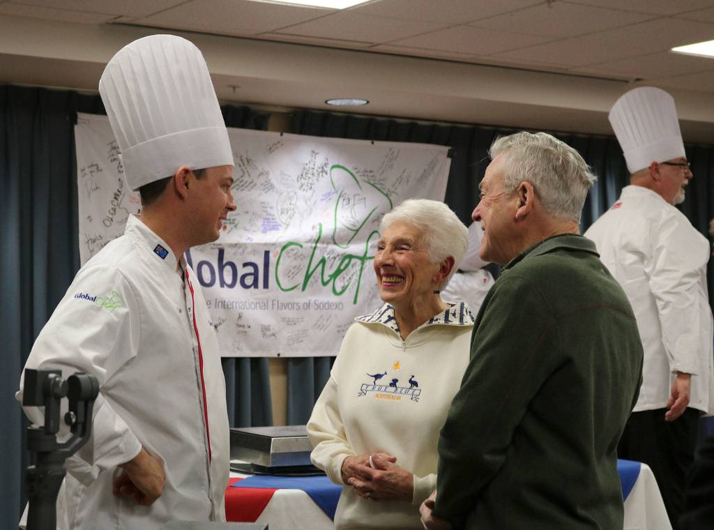 Fay and Russell Cheetham, Covenant Shores residents from Australia, meet Sodexo Chef Steve Laybourn after his cooking demonstration. Katie Metzger/staff photo