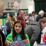 Photo courtesy of Erin Krawiec                                 Lexi Krawiec used chalkboard paint to create chalkboards that raised awareness for Save The Children, which works to provide access to education for children around the world.