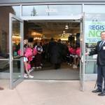MIYFS middle school counselor Harry Brown and community-based services manager Derek Franklin, along with the Mercer Island Sparkle Squad, welcome attendees to the 2019 breakfast at the Community and Event Center. Katie Metzger/staff photo