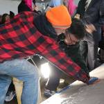 Redmond Mayor John Marchione was among many community members to place their hand prints in the wet cement below the new sign at the Muslim Association of Puget Sound in Redmond after the mosques old sign was vandalized in 2016. File photoMAPS Sign