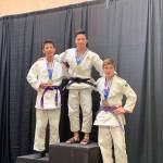 Mercer Island High School sophomore Tegan Yuasa, center, stands on the top spot at the podium sporting a gold medal from the USA Judo Youth National Championships on March 10 in Colorado Springs, Colorado. Photo courtesy of Mark Yuasa