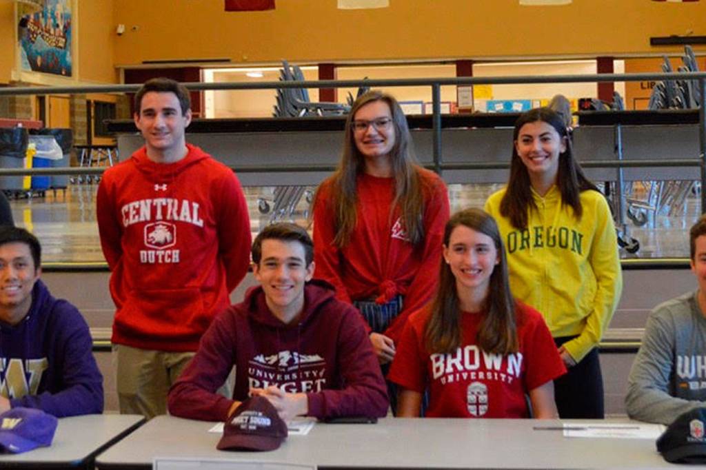 Mercer Island High School conducted a signing day ceremony for its collegiate bound student athletes on March 19 in the Mercer Island High School commons. Athletes moving on to compete at the collegiate level consist of Stew Vassau (lacrosse-University of Utah), Cole Miller (baseball-University of Washington), Natalie Wilson (softball-Loyola Marymount University), Lina Winiski (rowing-Washington State University), Alex Kaczor (soccer-Central College), Jordan Snyder (soccer-University of Oregon), James Richardson (swimming-Massachusetts Institute of Technology), Grace Fujinaga (lacrosse-University of Pennsylvania), Donnie Howard (lacrosse-Boston University), Ryan Payne (lacrosse-Illinois Wesleyan), Brandon Wong (tennis-University of Washington), Blake Robertson (soccer-University of Puget Sound), Matthew Capone (soccer-Northwest Nazarene), Maggie Baker (track-Brown University) and Teague Conder (baseball-Whitman College).                                Photo courtesy of Craig Degginger