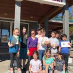 The owner of Toshis Terikyaki on Mercer Island met with members of the Lakeridge student green team, who urged businesses to switch from Styrofoam to recyclable or compostable to-go containers. Photo courtesy of Nancy Weil