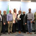 Lisa and Rino Caruccio smile with the Mercer Island City Council after being named Citizens of the Year on April 2. Katie Metzger/staff photo