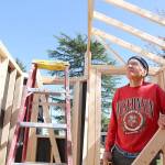Stephanie Quiroz/staff photo                                 Tom Kofler helps build the tiny house at Mercer Island United Methodist Church.