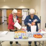 St. Jude Parish members made 125 sack lunches on March 30. Stephanie Quiroz/staff photo.