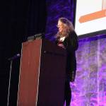 Madison Miller / staff photo                                 Pulitzer Prize-winning author, Caroline Fraser, receives a Pathfinder award at the 15th annual Breakfast of Champions fundraiser.