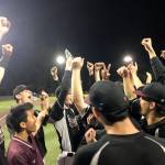 Mercer Island Islanders celebrate after being presented the KingCo 3A baseball tournament championship trophy just minutes following the final out against the Interlake Saints on May 6 at Bannerwood Park in Bellevue. Shaun Scott/staff photo