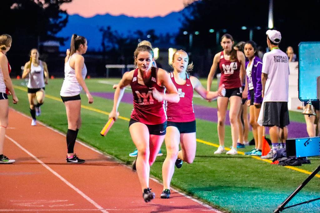 The Mercer Island Islanders girls 1600 relay team consisting of athletes Maggie Baker, Maya Virdell, Gretchen Blohm and Ashley Rudd, earned first place with a time of 4:07.66 at the 3A KingCo track championships in Kirkland. Photo courtesy of Don Borin/Stop Action Photography