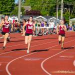 Mercer Island senior Maggie Baker (No. 5) captured first place in the 400 at the 3A KingCo track meet at Lake Washington High School in Kirkland. Photo courtesy of Don Borin/Stop Action Photography