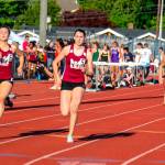 Mercer Island senior Maggie Baker (No. 5) captured first place in the 400 at the 3A KingCo track meet at Lake Washington High School in Kirkland. Photo courtesy of Don Borin/Stop Action Photography