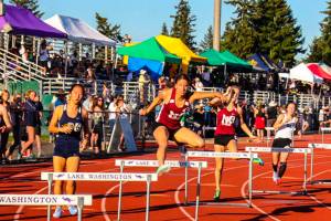 Mercer Island junior Maya Virdell (pictured) captured first place in the 300 hurdles at the 3A KingCo track meet at Lake Washington High School in Kirkland. Photo courtesy of Don Borin/Stop Action Photography
