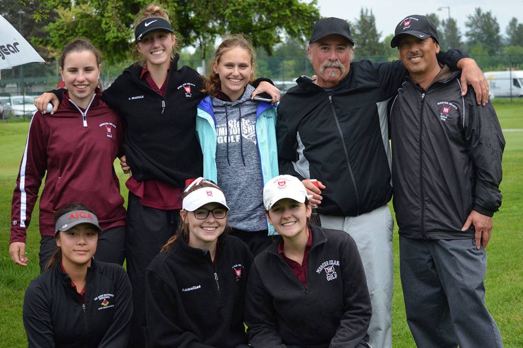 The Mercer Island Islanders girls golf team captured third place as a team at the 2019 3A Sea-King girls district golf tournament on May 13. The third place finish ensured the Islanders varsity golf team a berth at the Class 3A state tournament. Islanders golfers pictured in the above photo are Gihoe Seo, Annelise Rorem, Katelyn Travis, Yumi Baston, Grace Shaddle and Lilly Pruchno. Mercer Island coaches Don Papasedero and Tim Okamura are pictured on the right. Photo courtesy of Billy Pruchno