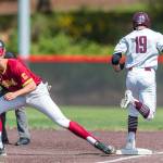 Mercer Island Islanders senior Grant Stading (No. 19) hustles down the first-base line after hitting a grounder against the Capital Cougars. Capital defeated Mercer Island, 7-1, in the first round of the 3A state playoffs. Photo courtesy of Patrick Krohn/Patrick Krohn Photography