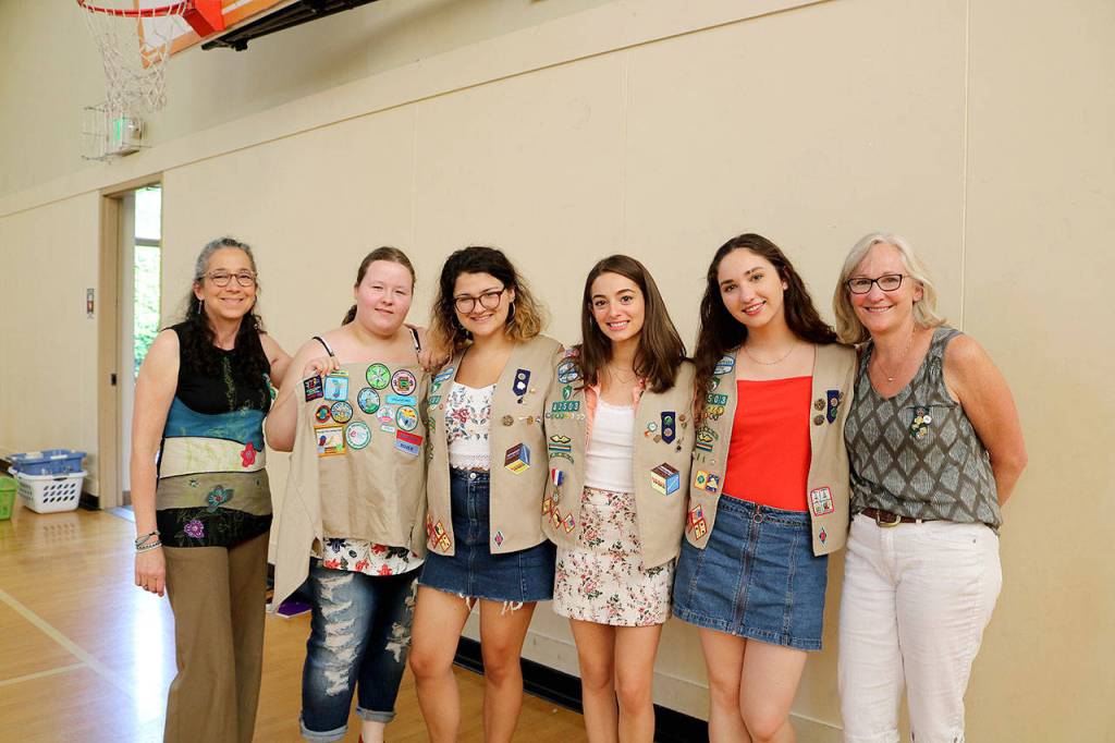 Stephanie Quiroz/staff photos                                 Graduating seniors from left troop leader Anne Hritzay, Leia Saloranta, Hannah Sidney, Kyla Mitchell, Emily Kovarik, and Troop leader Lori Kovarik.