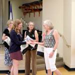 Troop 42503 leader Lori Kovarik and others receive volunteer recognition.