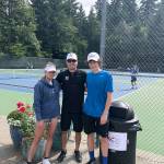 From left: middle schooler Valeriya Alekseykina, coach Jesse Walter, and Andrew Kaelin at the X-Out Cancer Fundraiser Jr. Tournament during the month of June. The team helped raise nearly $1658 which will help aid cancer families at Seattle Childrens. Courtesy photo of Gerry Kaelin