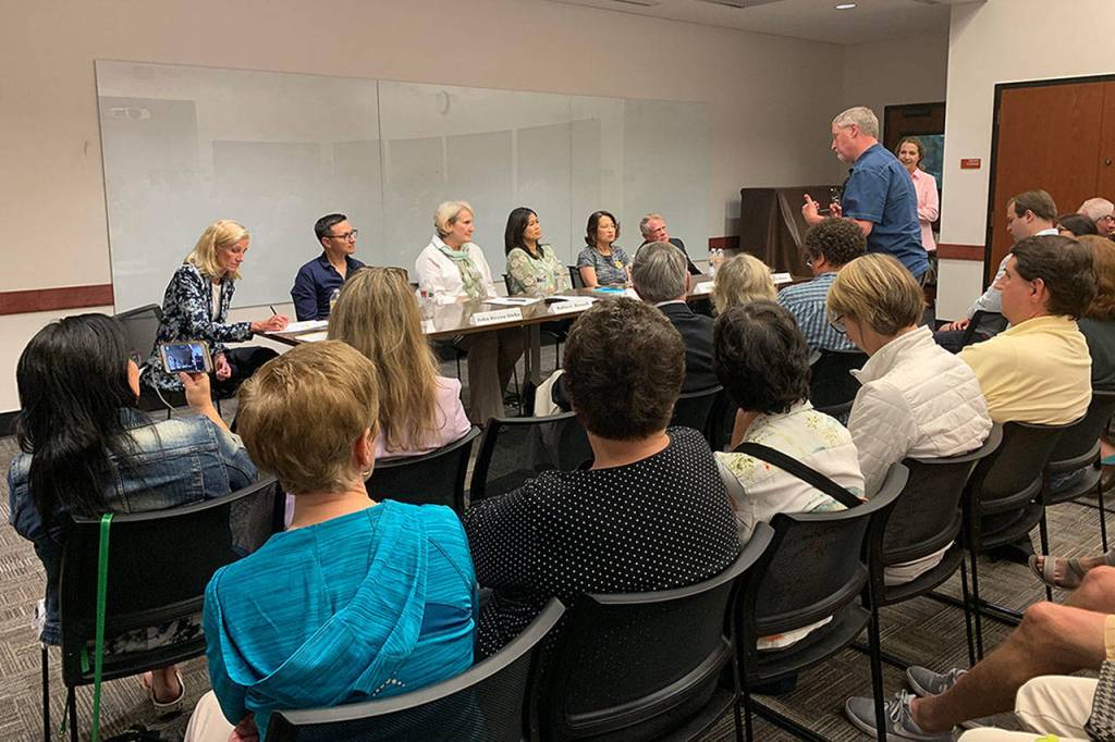 A full room of Mercer Island residents questioned candidates running for City Council Pos. 7 and School Board Pos. 5. Madeline Coats/staff photo                                 Six candidates sat in a panel at Mercer Island Library on July 15. They discussed their various perspectives on issues facing the community. Madeline Coats/staff photo